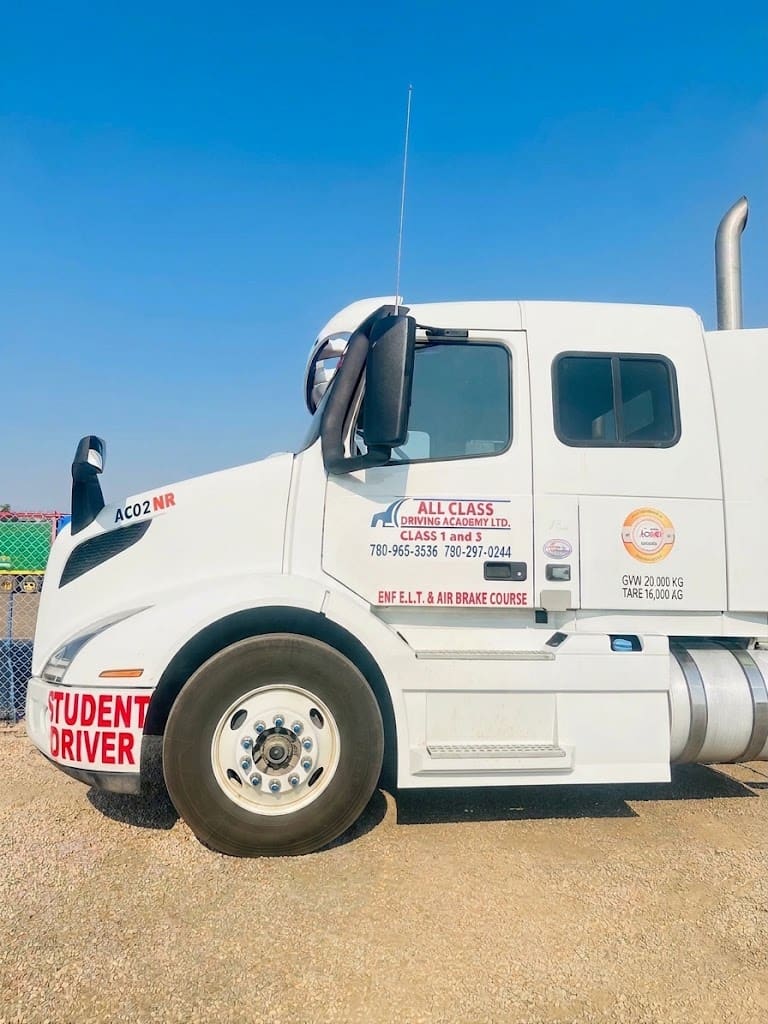 All Class Driving Academy student driver truck cab, side profile